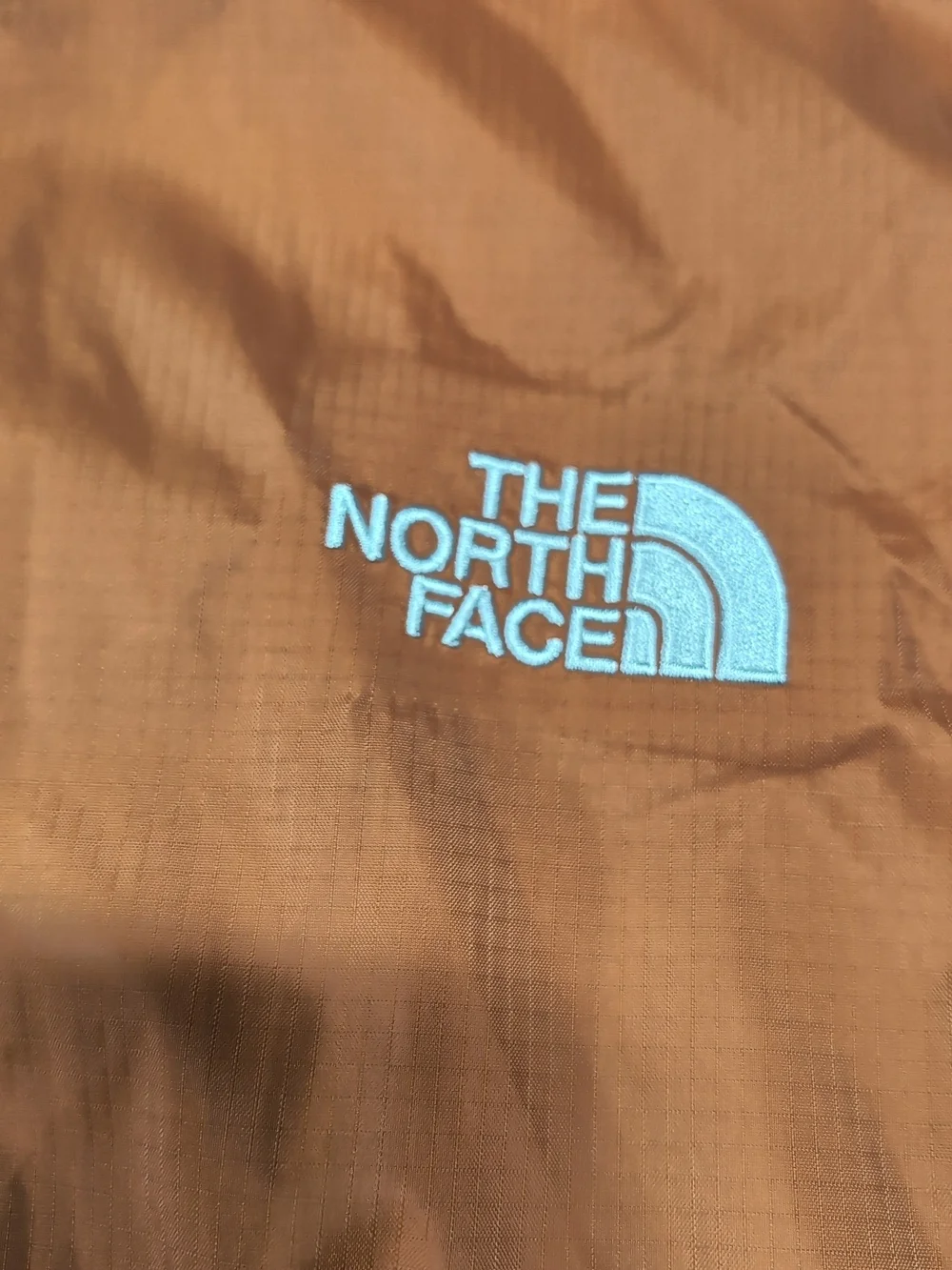 The North Face Men's Orange Hooded Shell Jacket